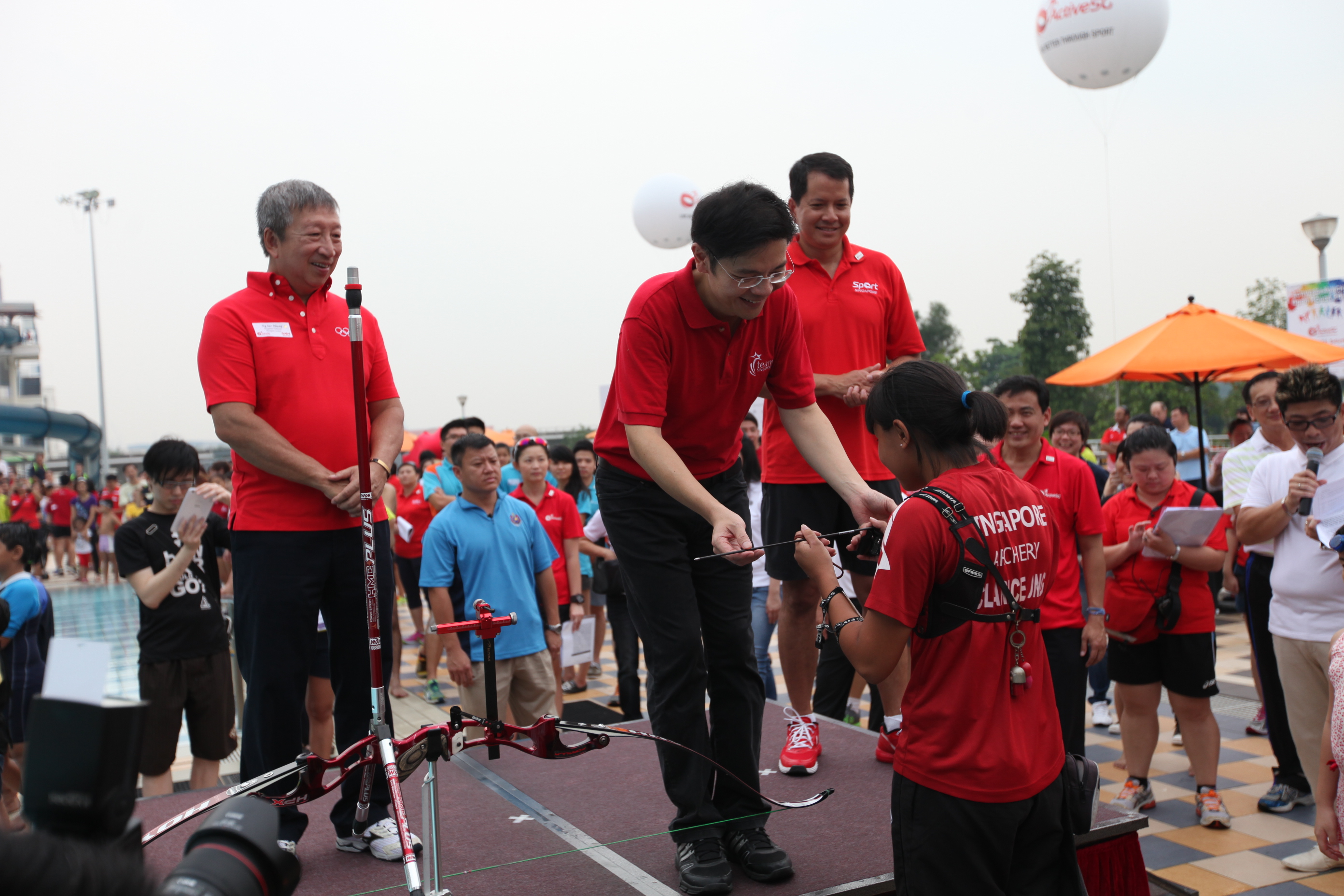 VP Ng Ser Miang Ag Min Mr Lawrence Wong and Mr Richard Seow commencing the launch of ActiveSG